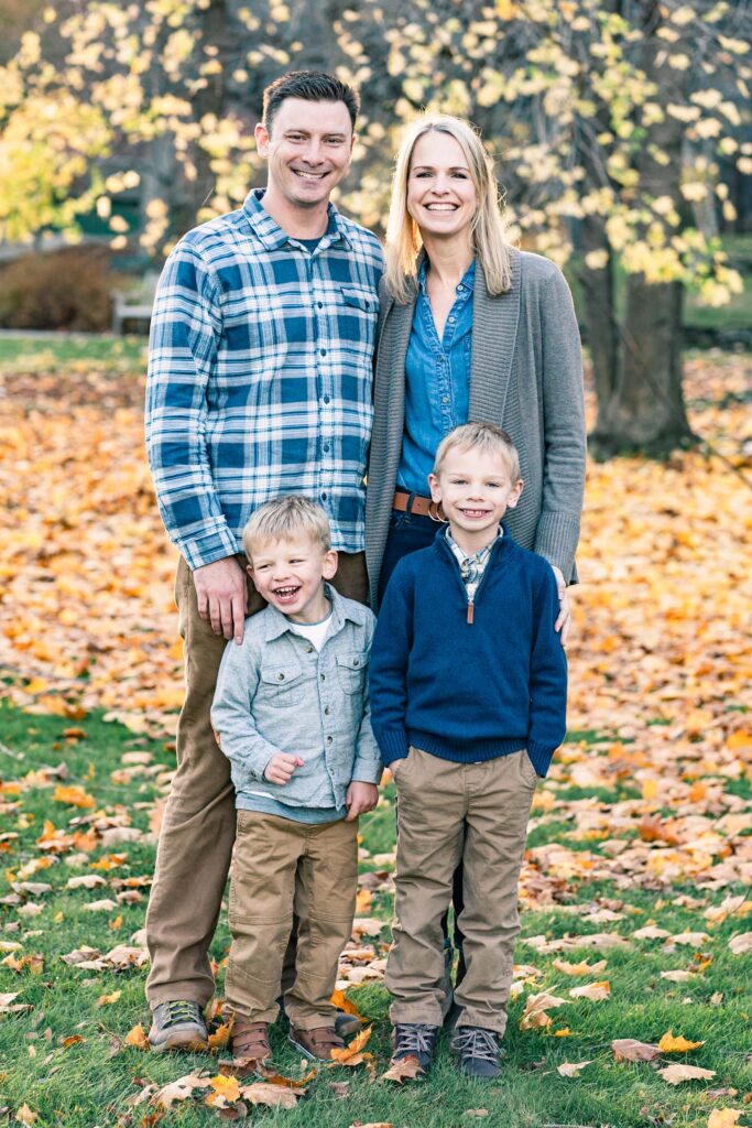 woodstock vermont family photo session: parents standing with young sons