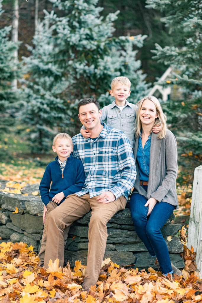 woodstock vermont family photo session: posed family portrait on stone wall