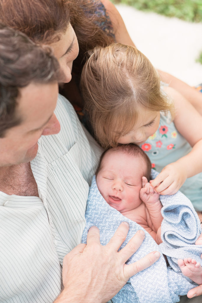 baby with family