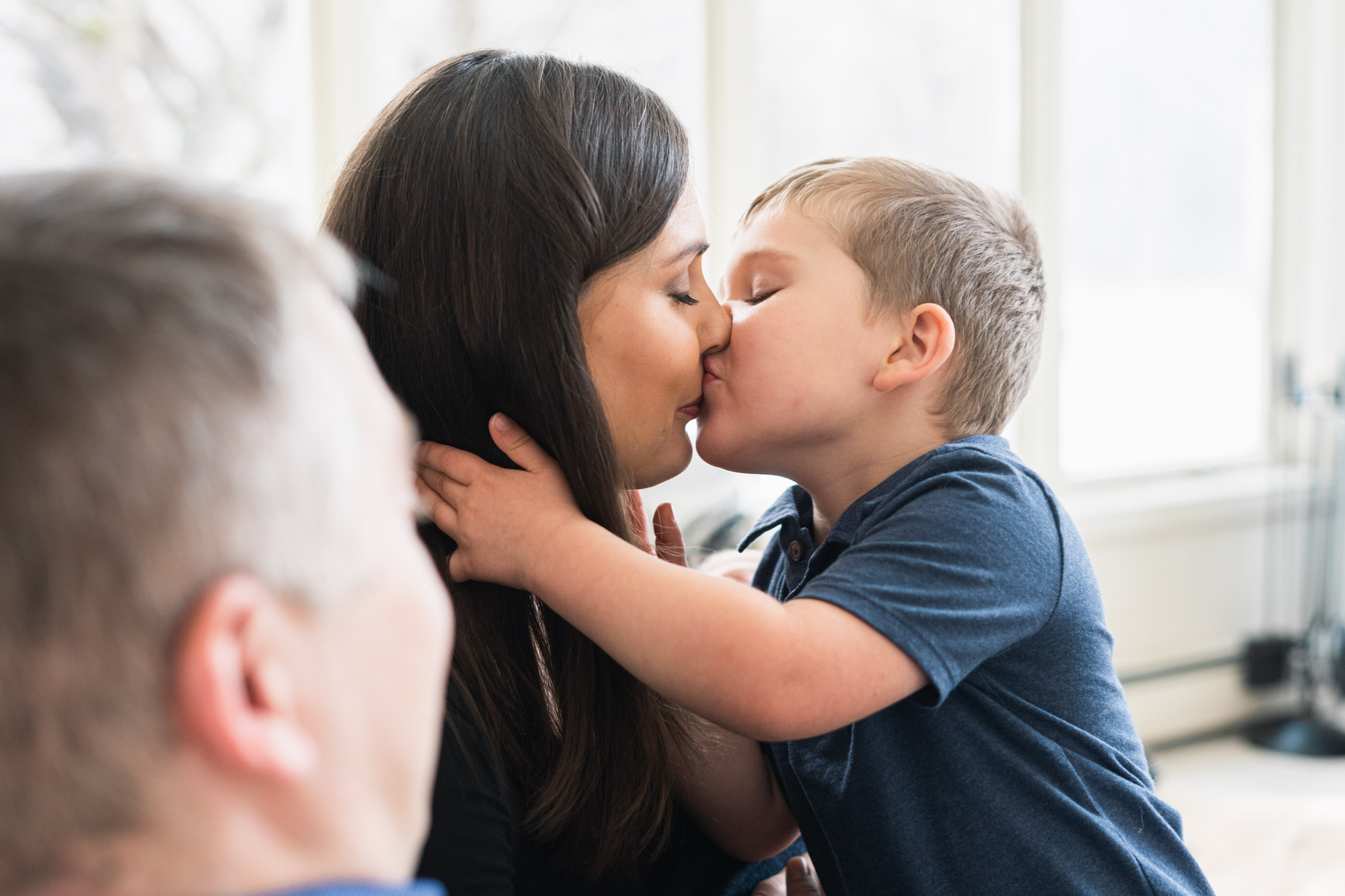 son kissing mom