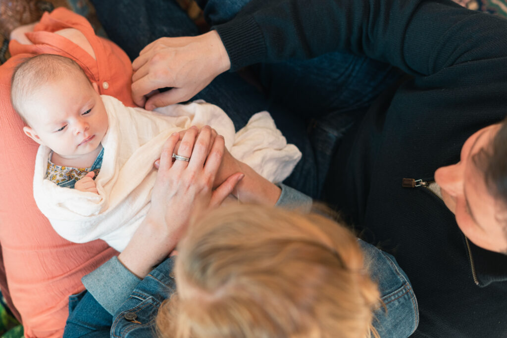 looking down on baby in lap