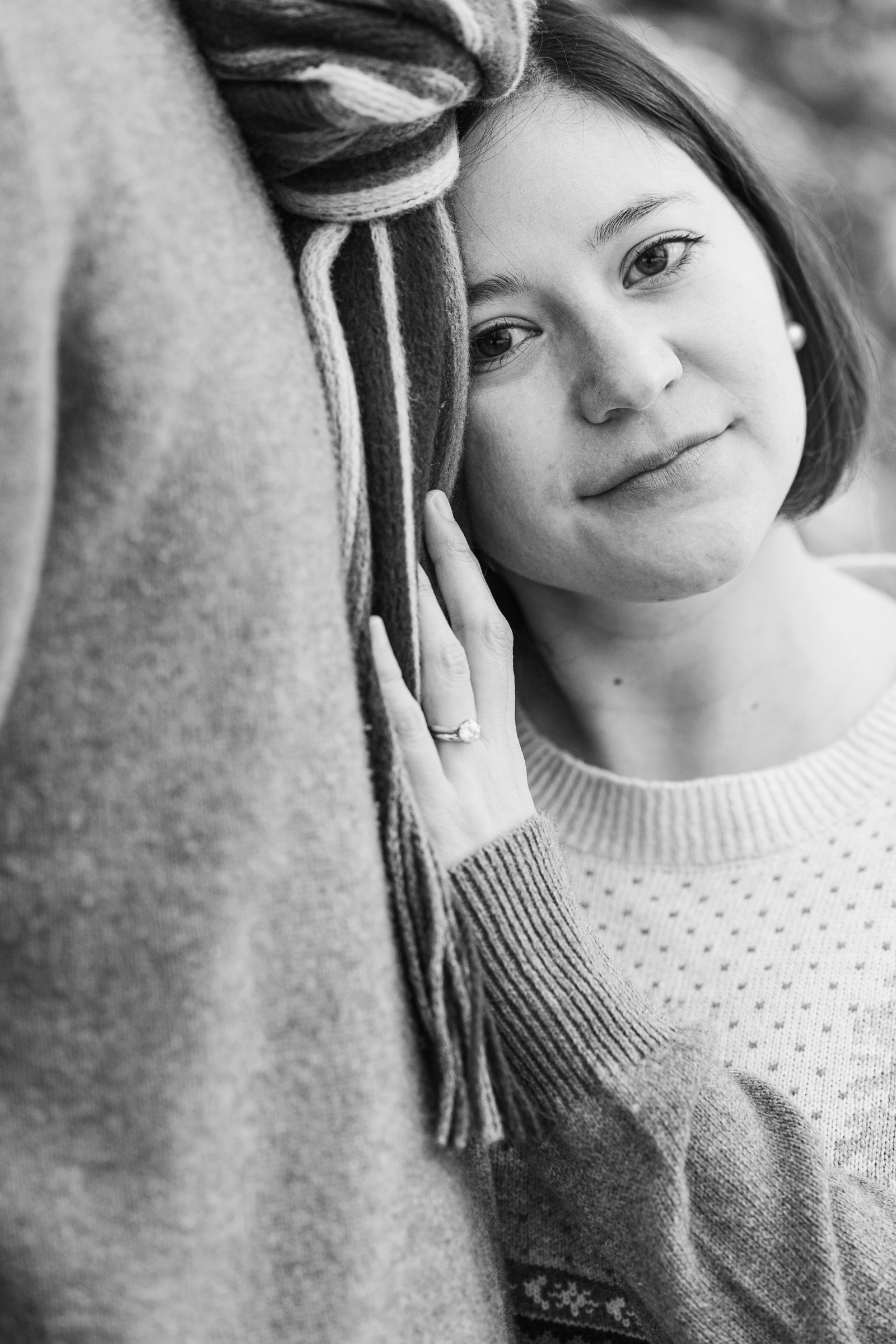woman resting head on husbands chest