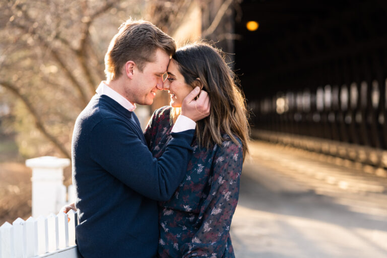 man holding earlob with golden light wrapped around them
