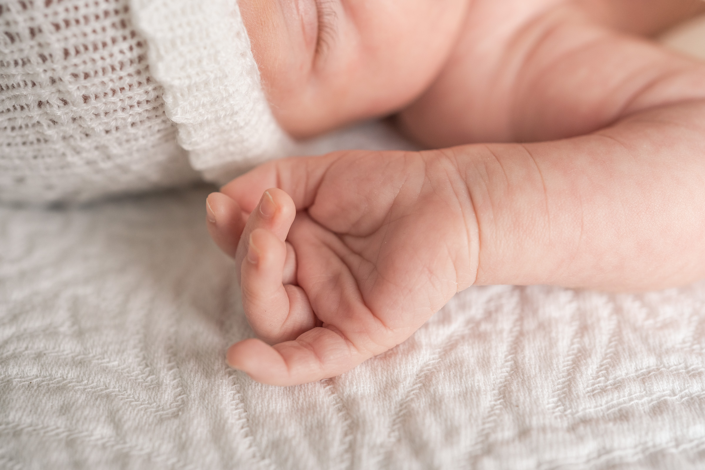 close-up of baby's tiny hands