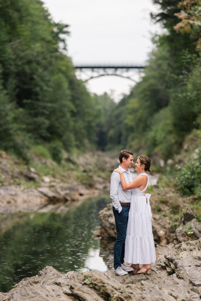 couple standing near each other near quechee gorge