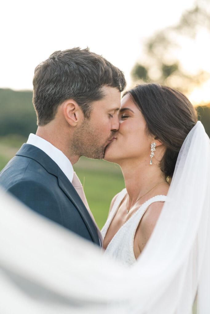 veil shot close-up bride and groom
