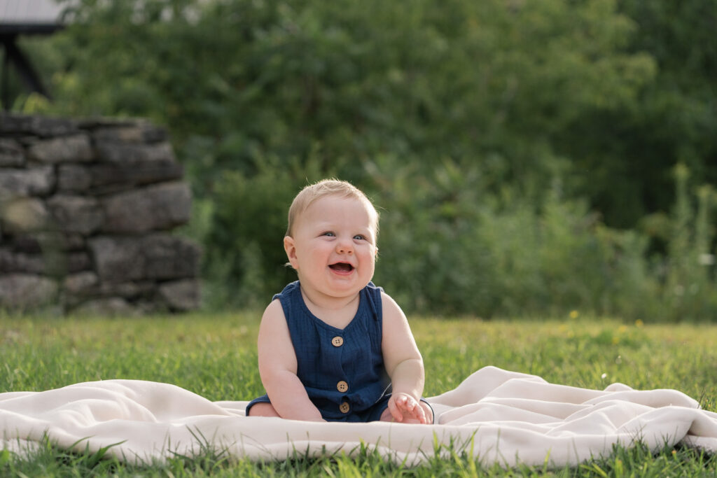 baby sitting on blanket