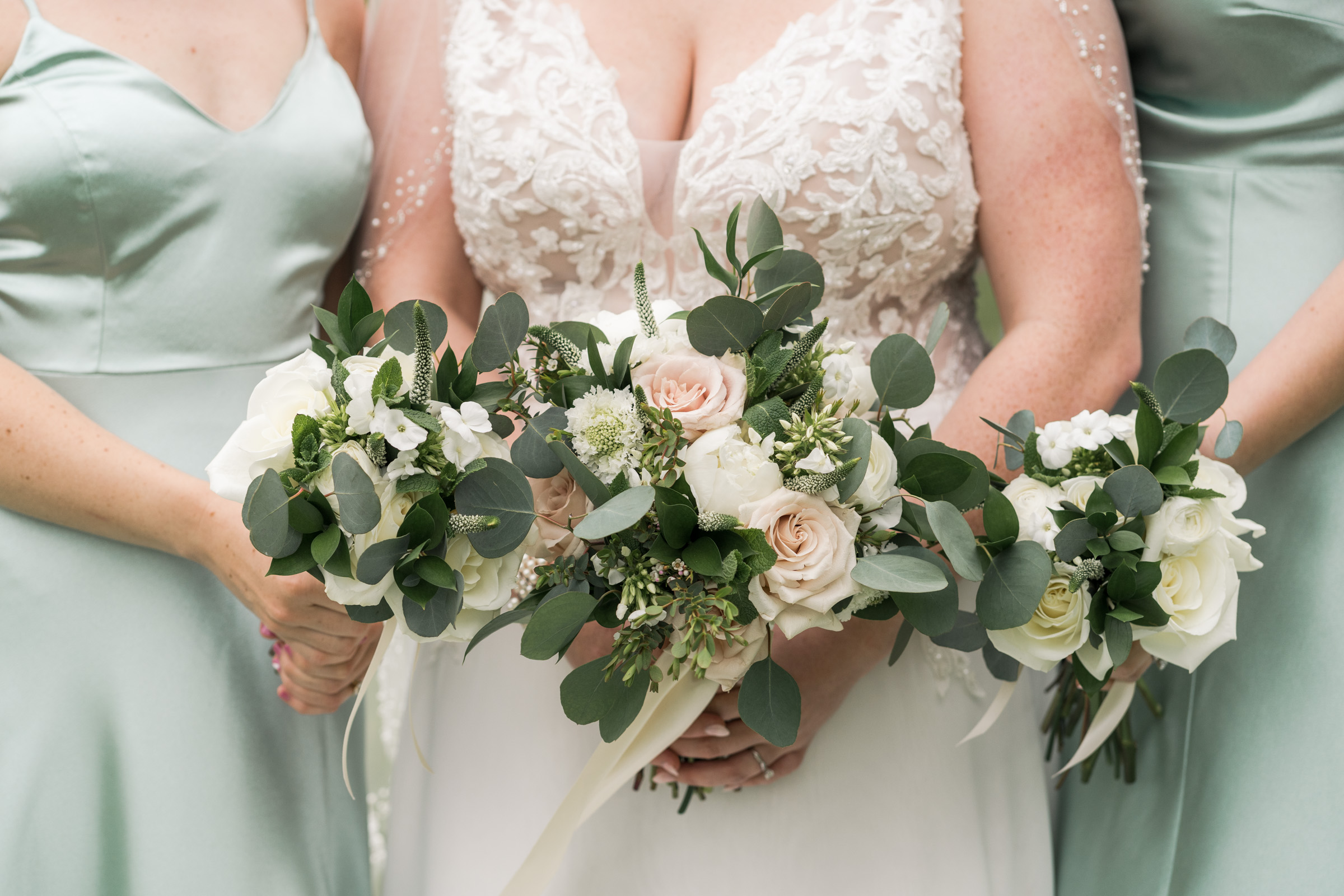 ladies with beautiful bouquets at round barn farm