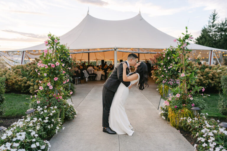Couple kissing in front of tent, connemara house wedding