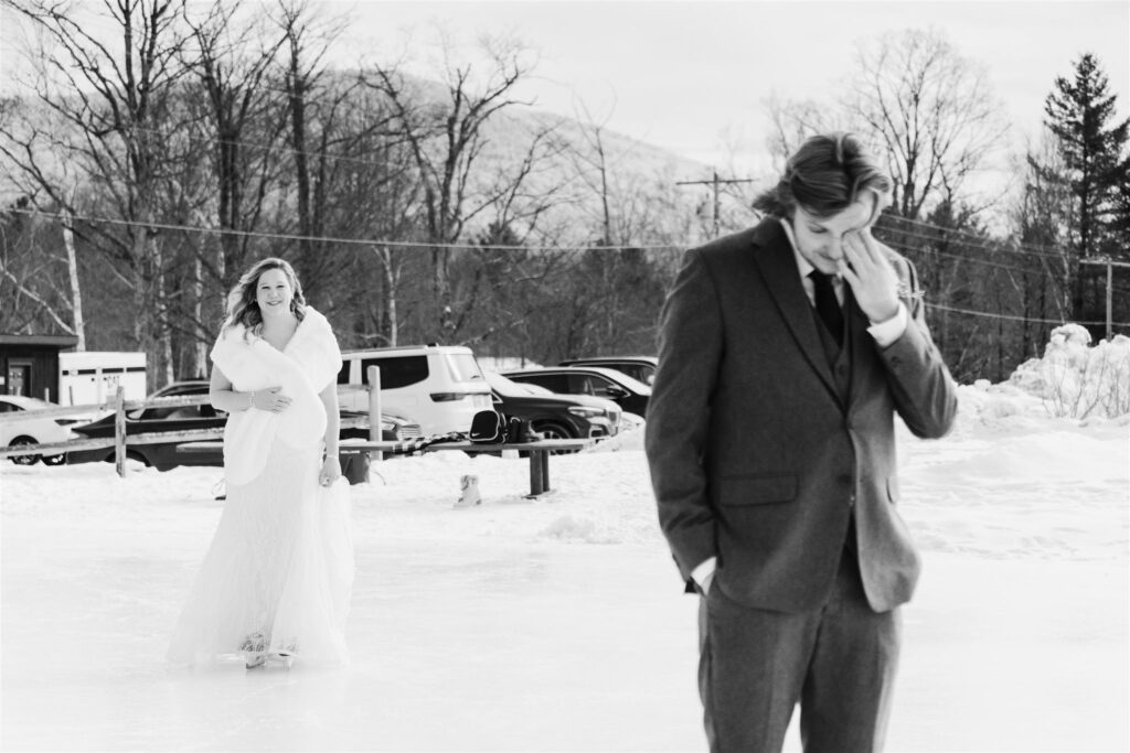 groom preparing for bride to enter for first look at mountain top inn, chittenden, vt