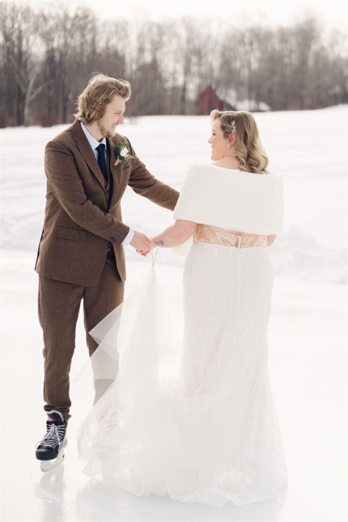 couple dancing on ice at mountain top inn, chittenden, vt