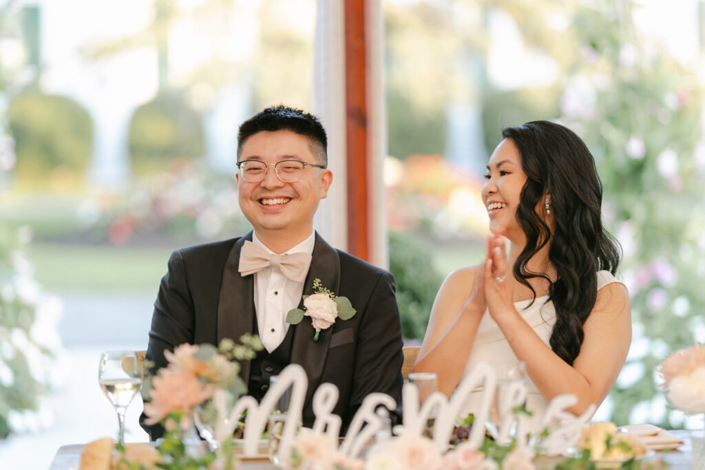 bride and groom at sweetheart table during reception at connemara house