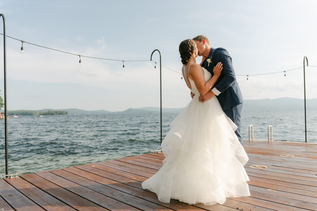 Lake Winnepesauke wedding, couple dancing on dock