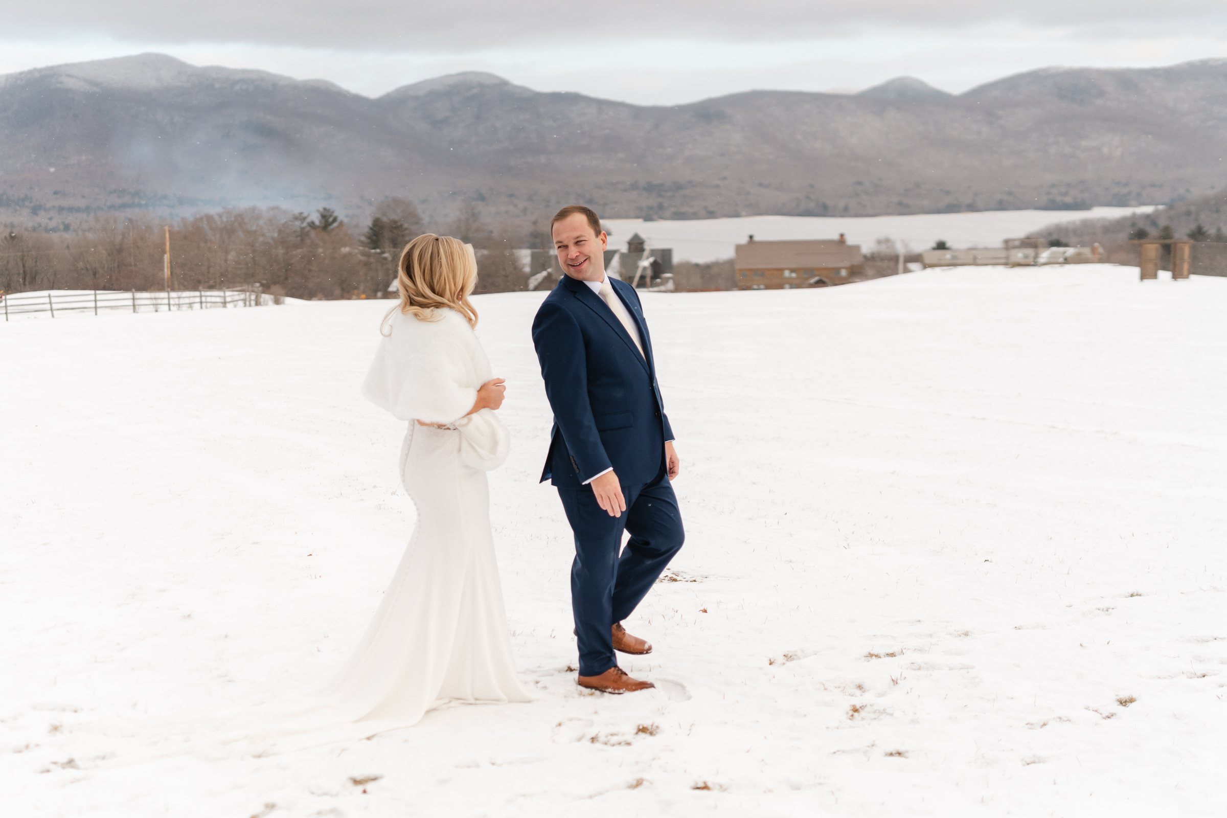 groom turns around to see bride at first look during Vermont Wedding at The Jewel at Mountain Top Inn