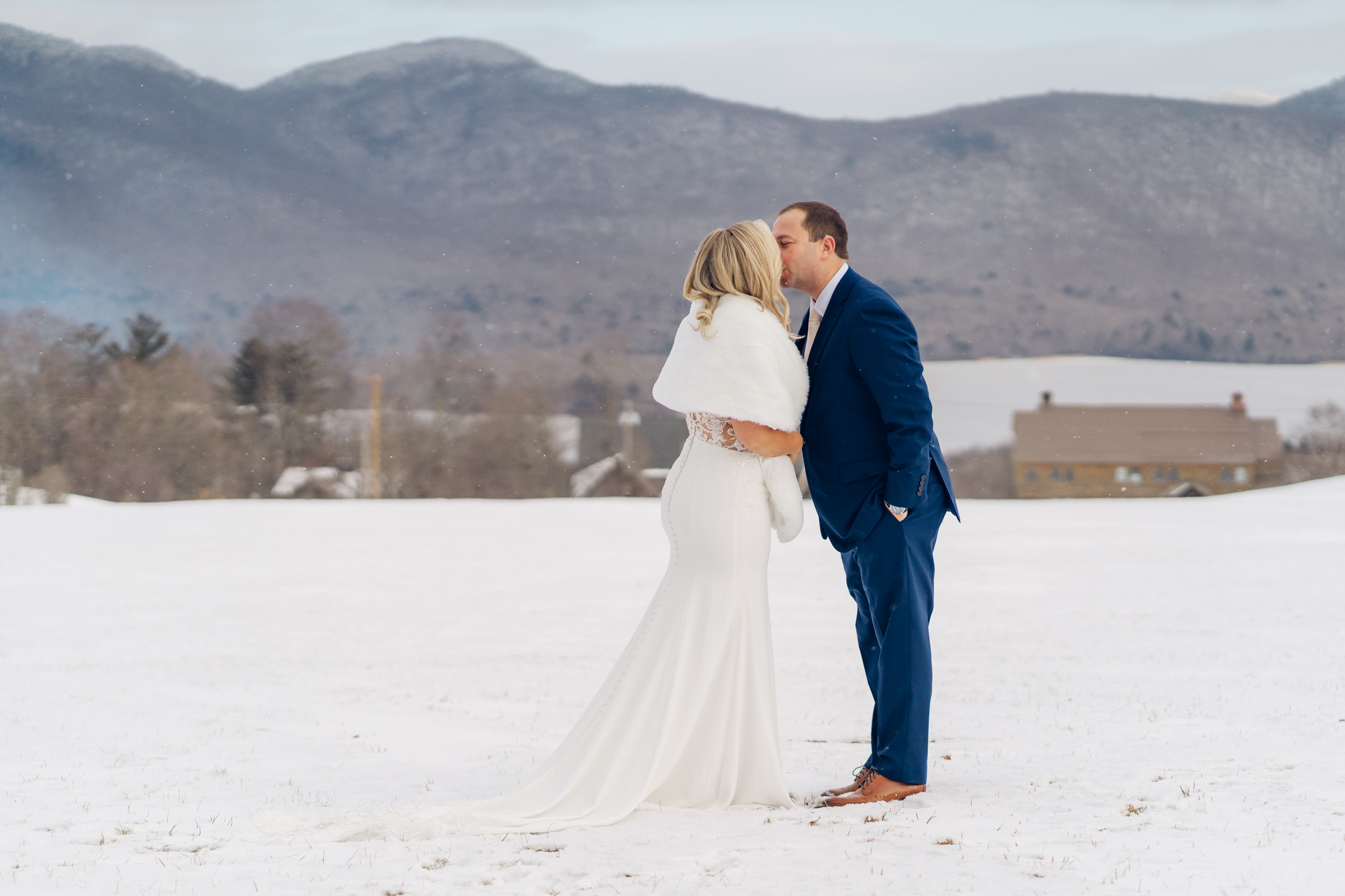bride and groom share a kiss during Vermont Wedding at The Jewel at Mountain Top Inn