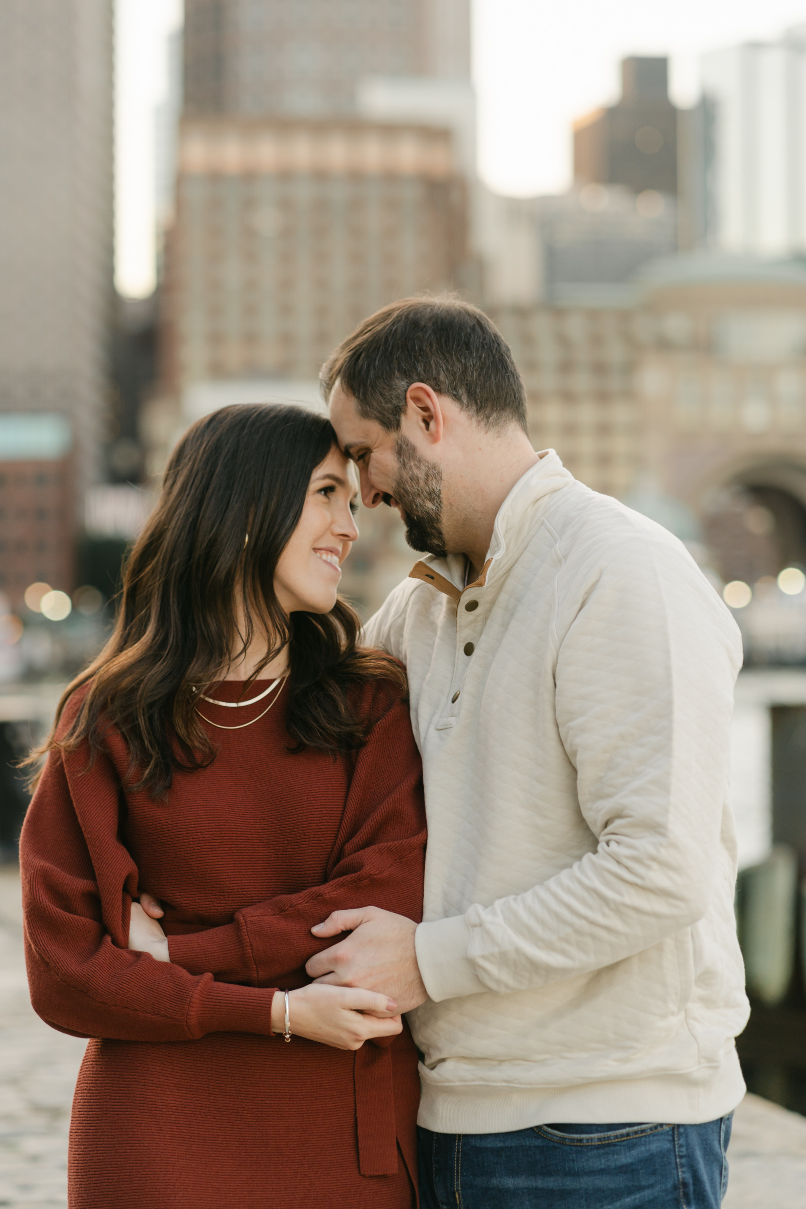 couple forehead to forehead during boston engagement session