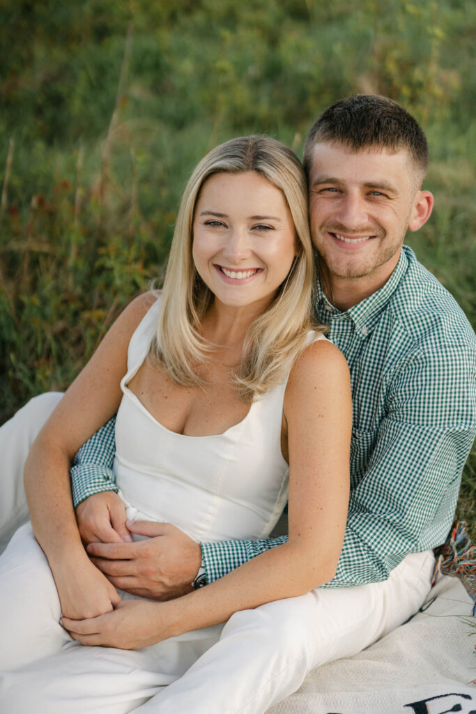 woman wrapped in man's arms
