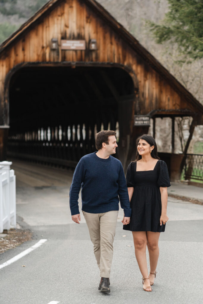 waling toward camera during woodstock vermont engagement session