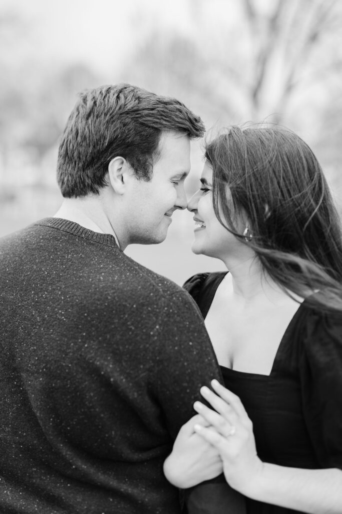 smiling and looking at each other during woodstock vermont engagement session