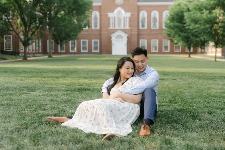 Dartmouth College engagement session in Hanover nh - couple snuggling on the green