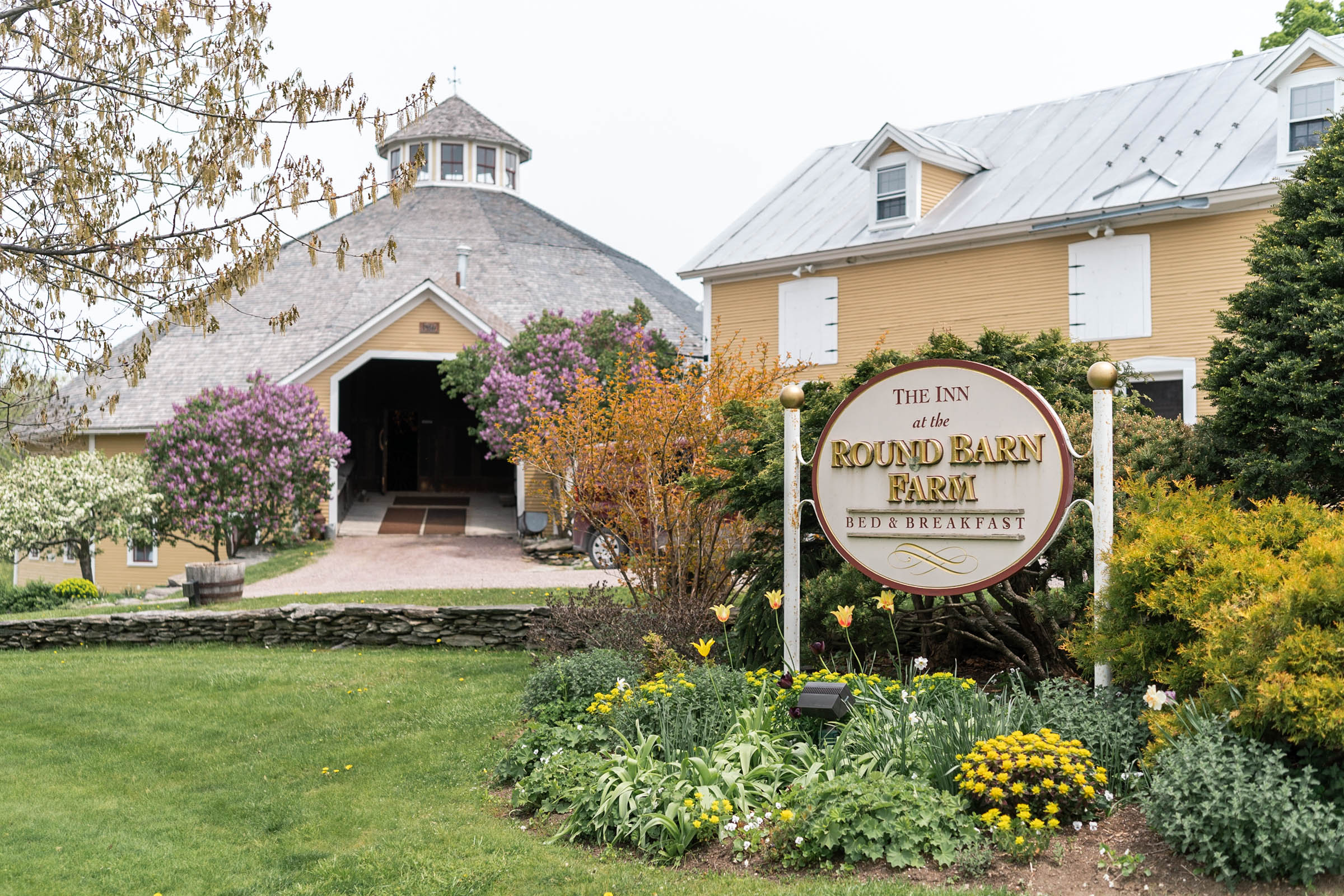 exterior shot of vermont wedding venue inn at round barn farm