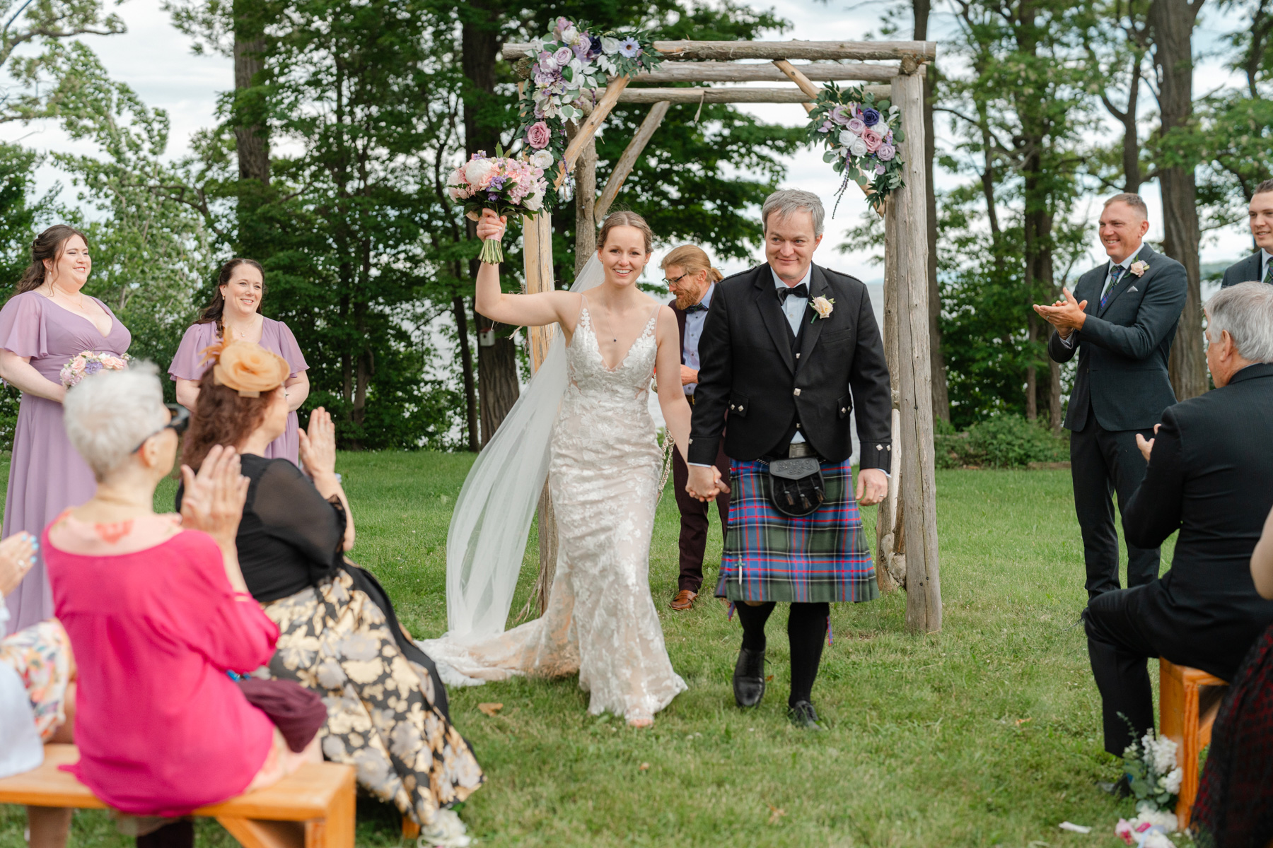 Just married couple recess down the aisle at Vermont wedding at Snow Farm Winery