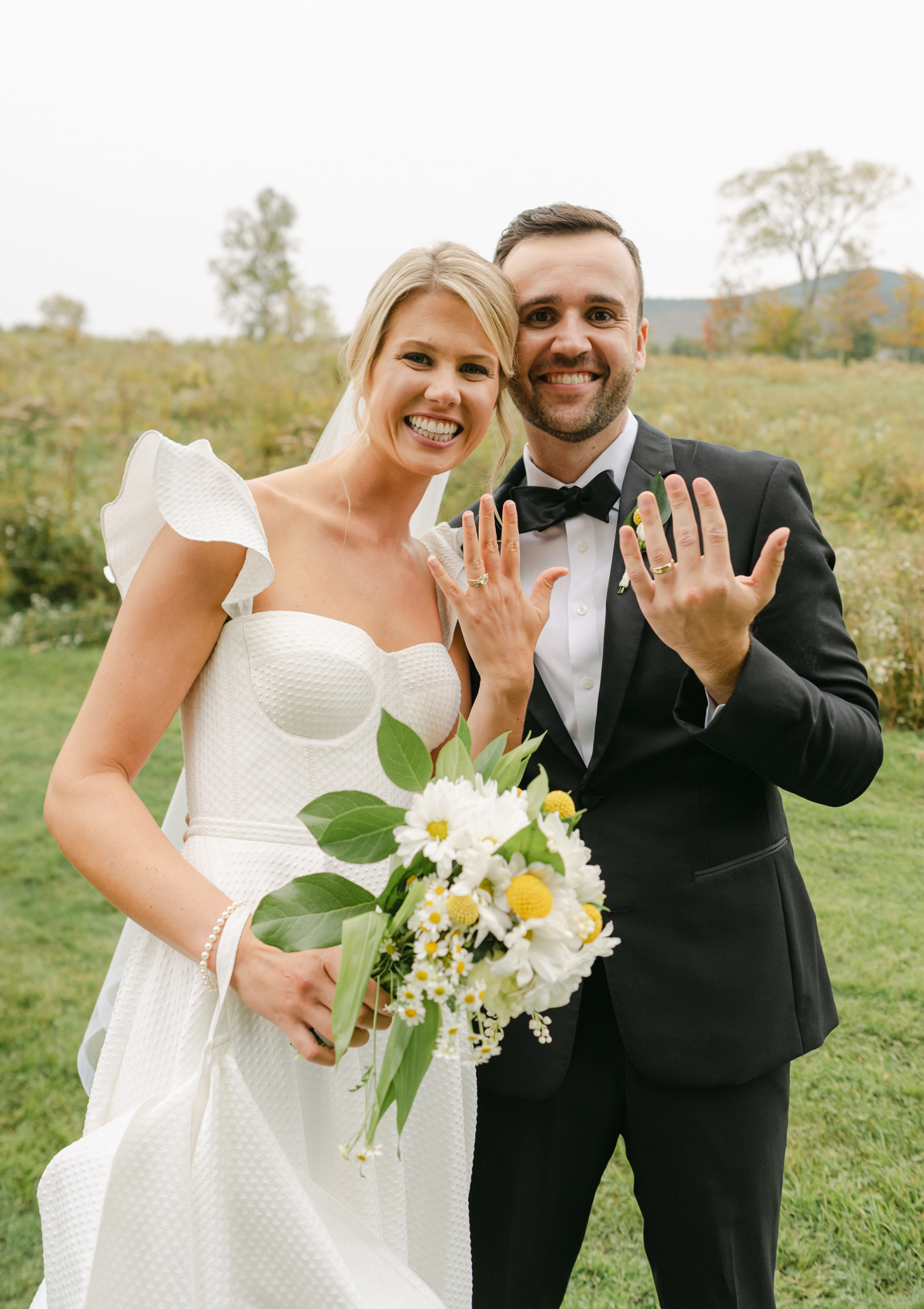 vermont wedding at Inn at round barn couple showing the rings