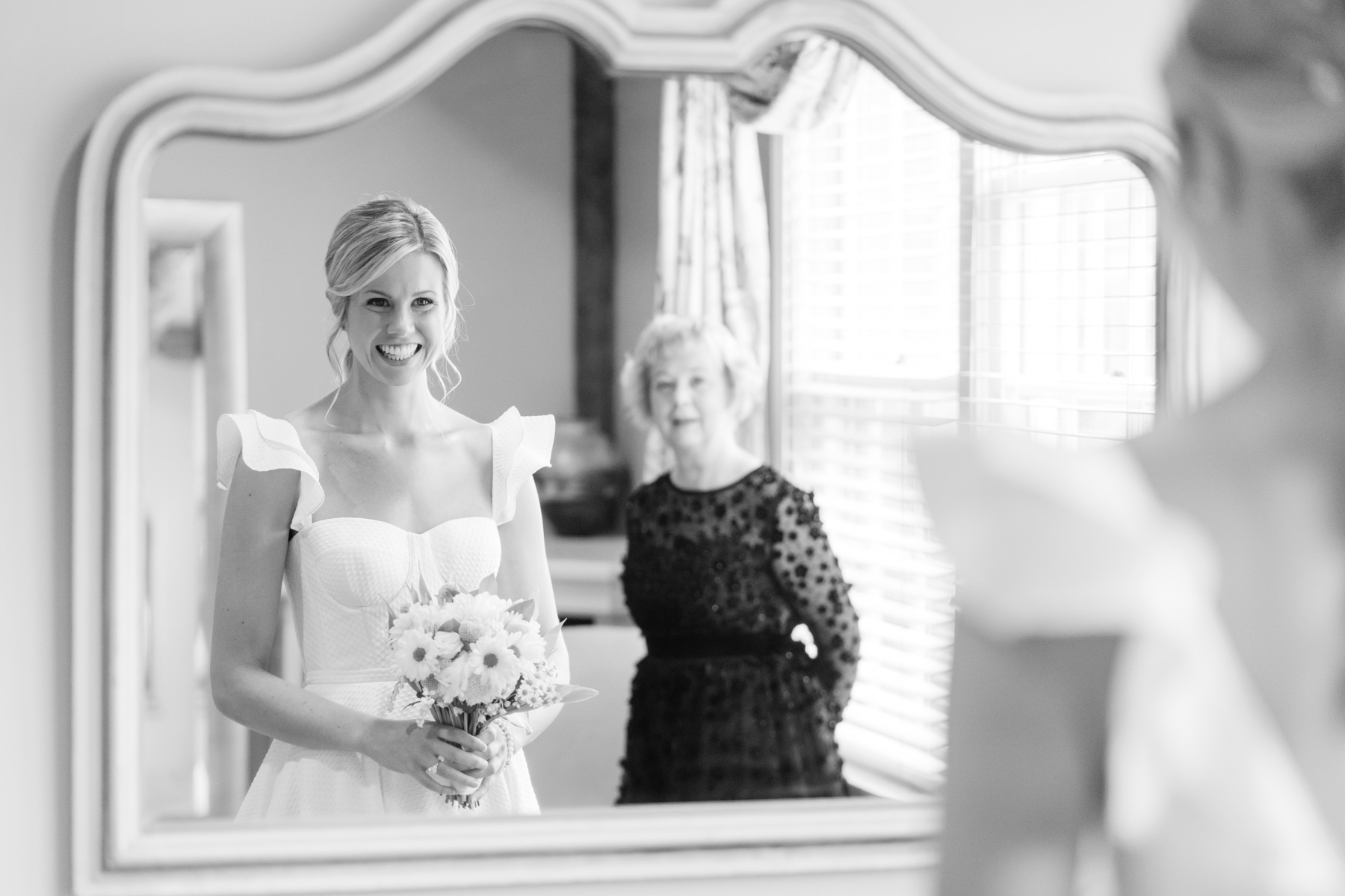 vermont wedding at Inn at round barn bride and mom looking in mirror