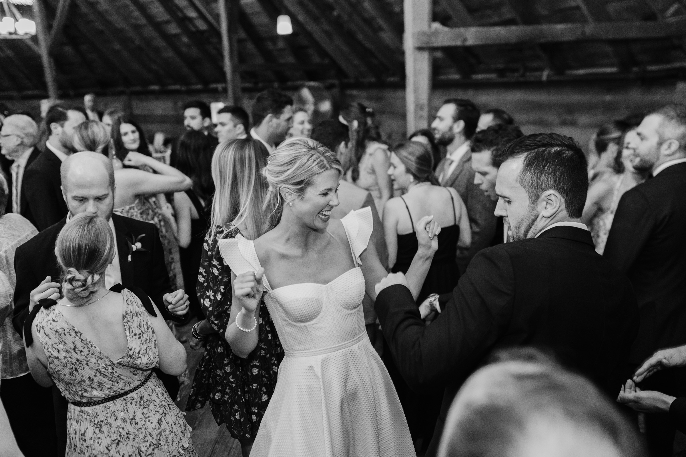 vermont wedding at Inn at round barn dance party candids of bride and groom