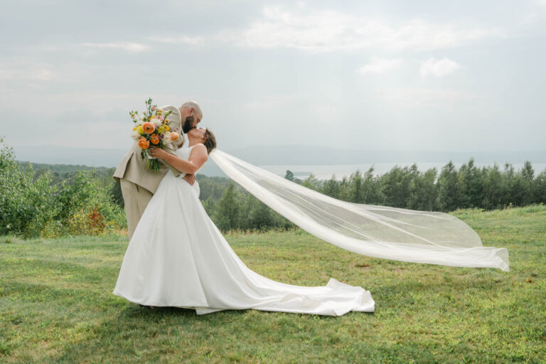 Stunning veil shot at barn at top of the world wedding in derby