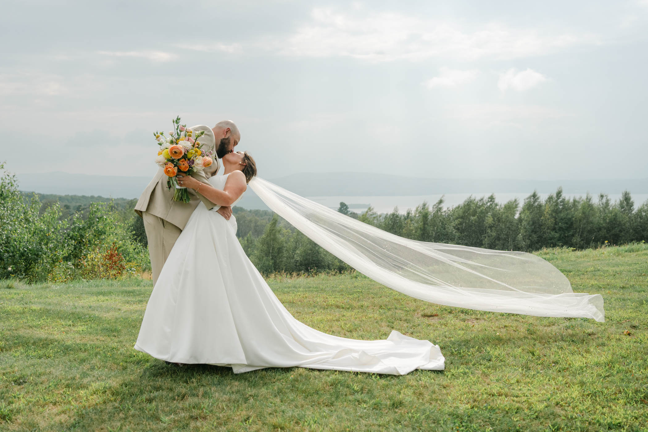 Stunning veil shot at barn at top of the world wedding in derby