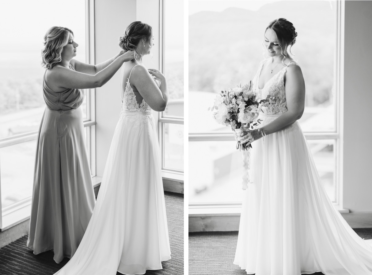 Vermont wedding at Jay Peak, maid of honer helping bride get ready
