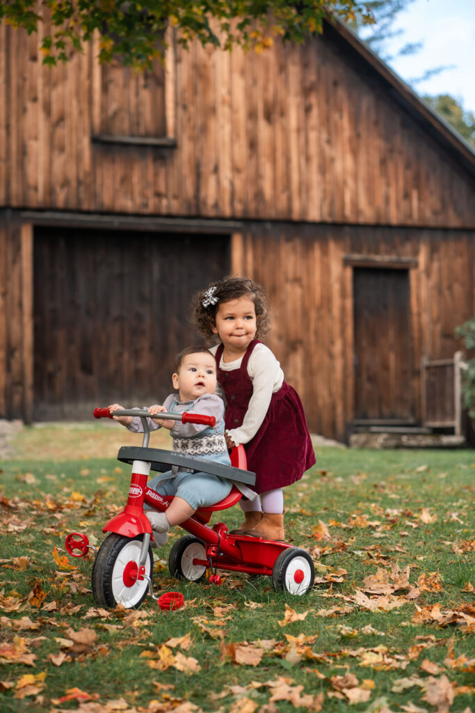 October Family Photos in Woodstock Vermont, kids on tricycle