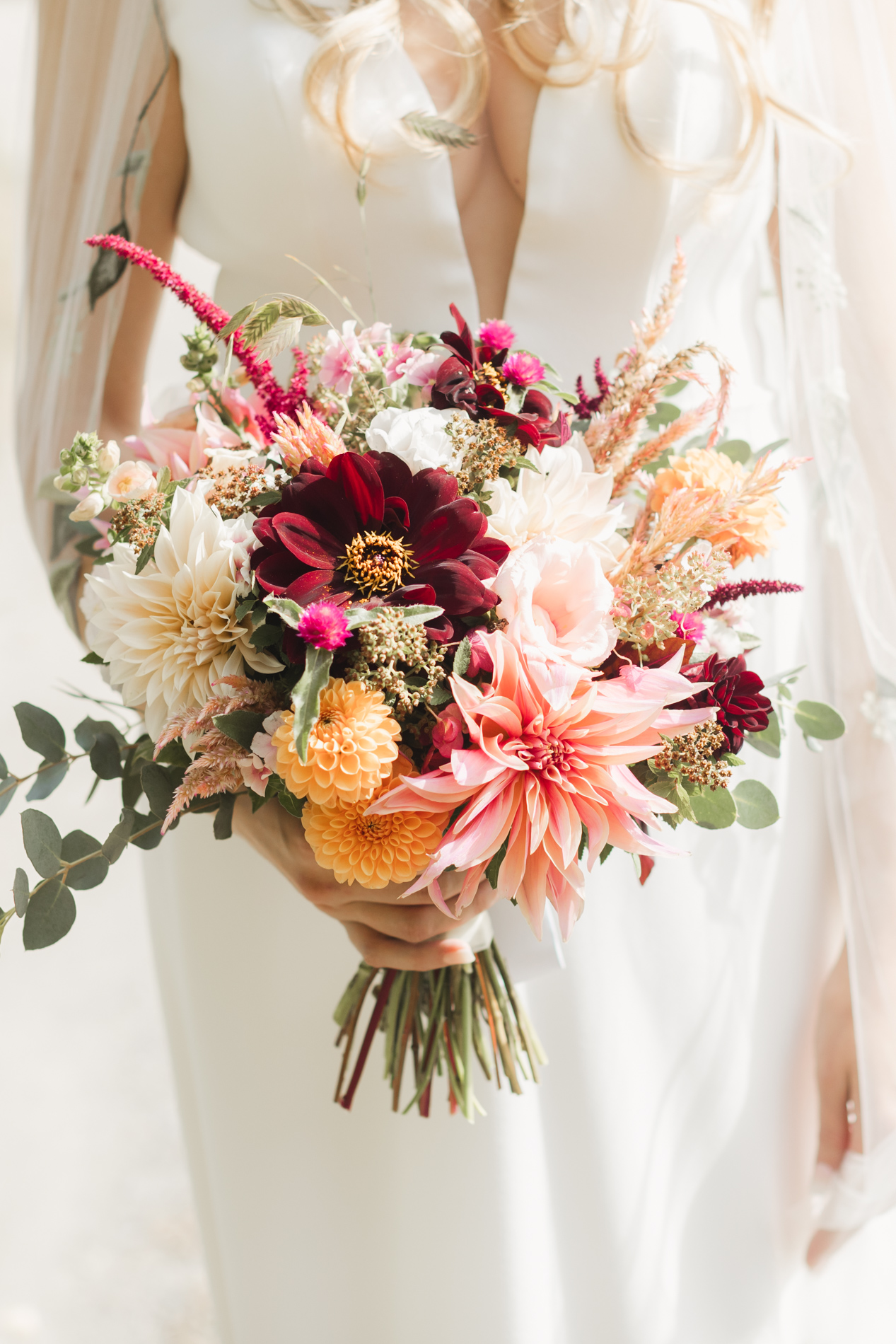 Bride carrying florals, grafton vermont wedding
