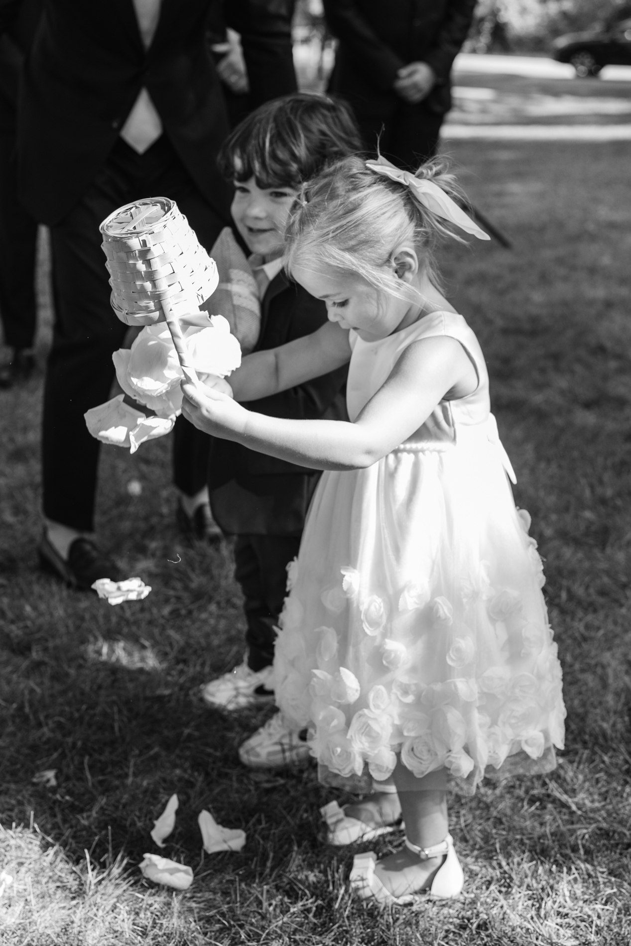 Flower girl dumping petals