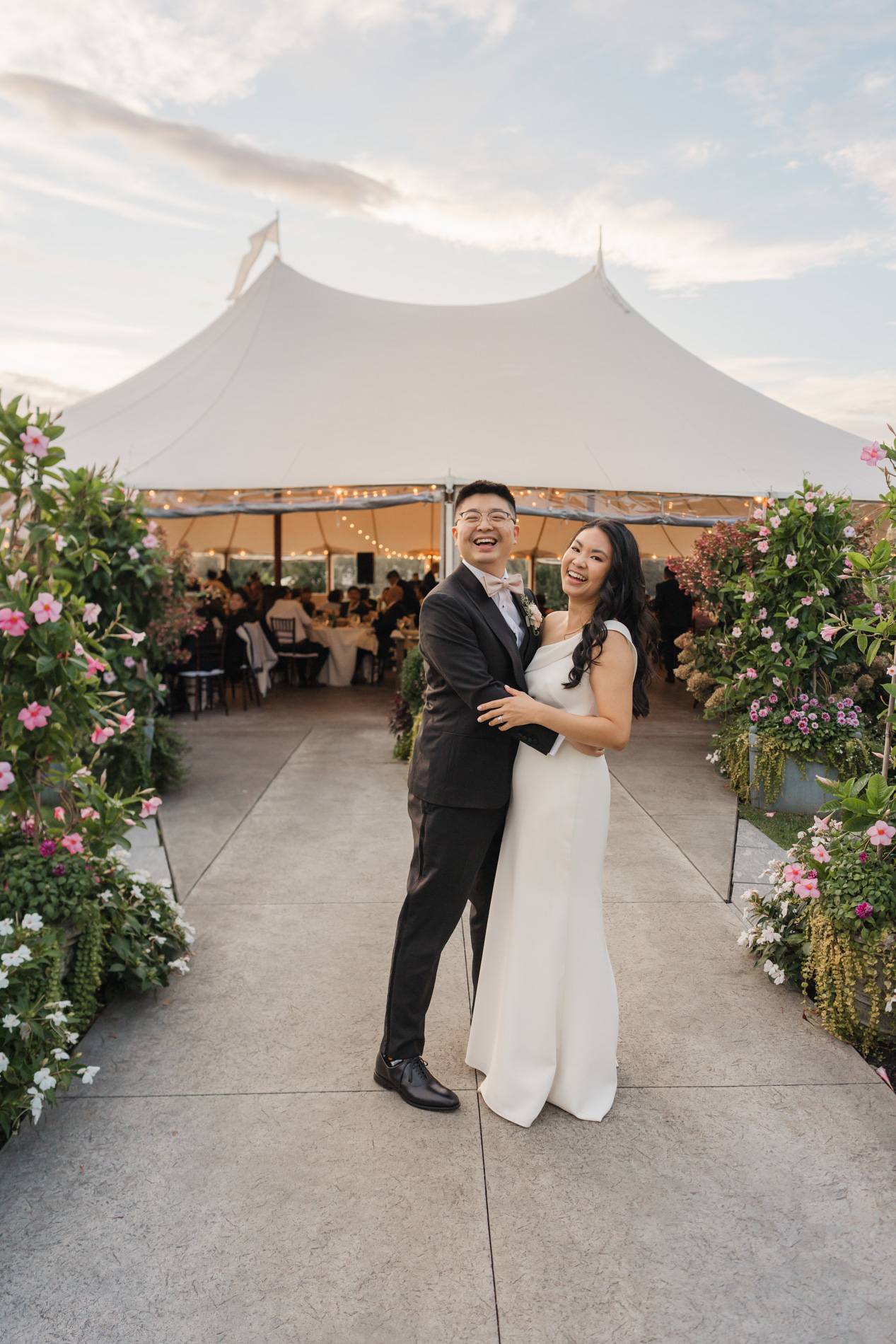 Couple standing in front of tent at Connemara House wedding venue