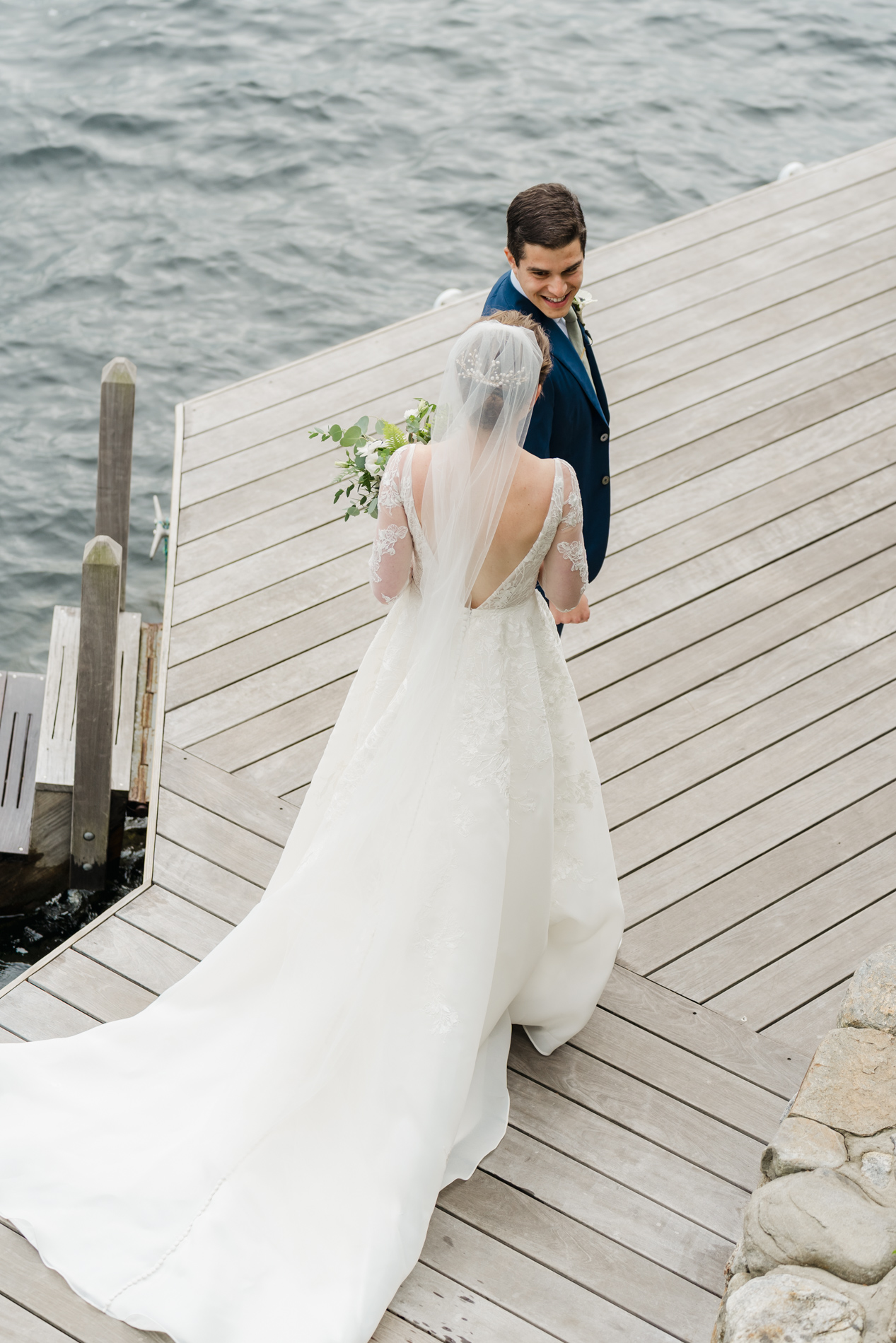 Couple sharing first look at Lake Sunapee during wedding