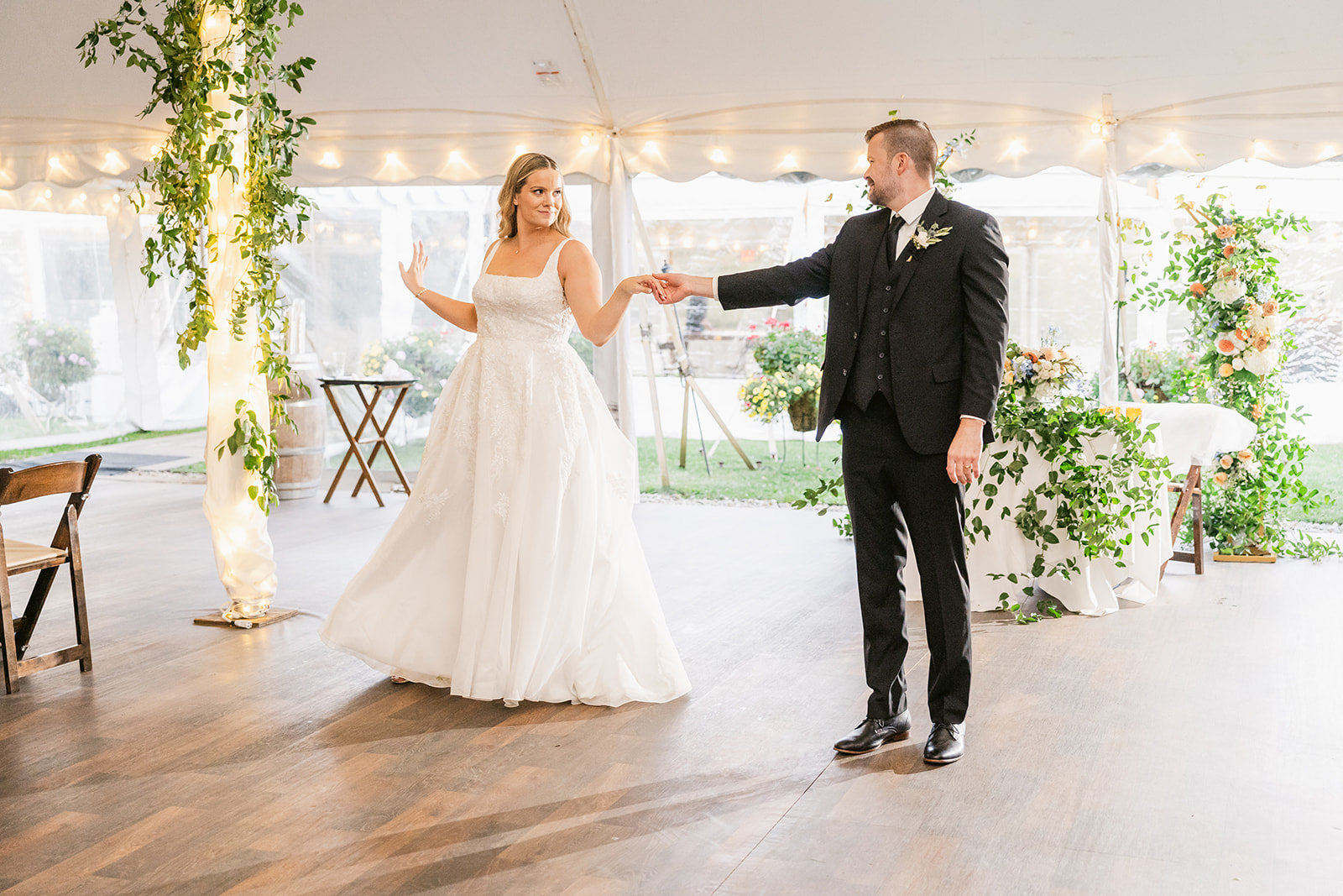 bride and groom are introduced and share first dance - Fall Trapp Lodge wedding
