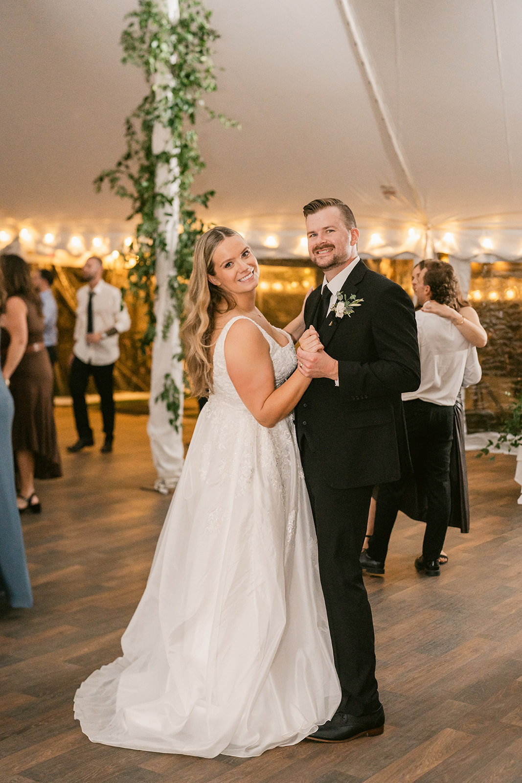 bride and groom dancing during reception - Fall Trapp Lodge wedding