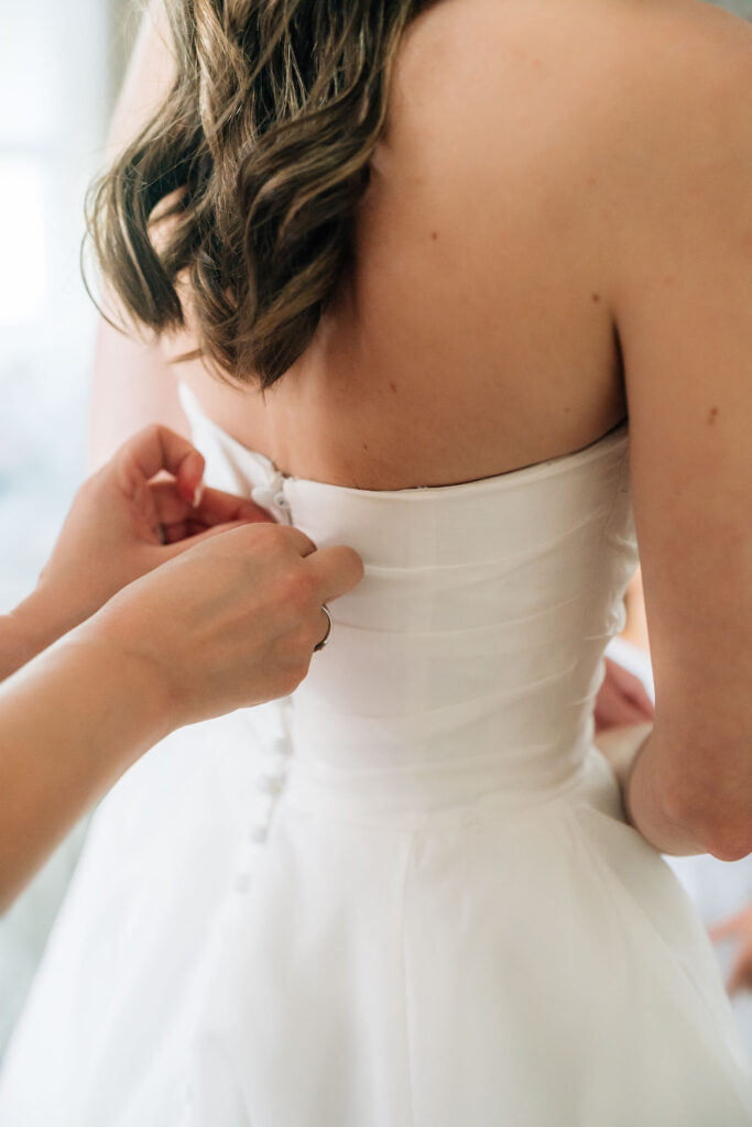 Harrington Farm Wedding - more buttoning