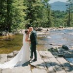 Bride and Groom, married Couple kiss at Jackson Falls during white mountain wedding at Eagle Mountain House