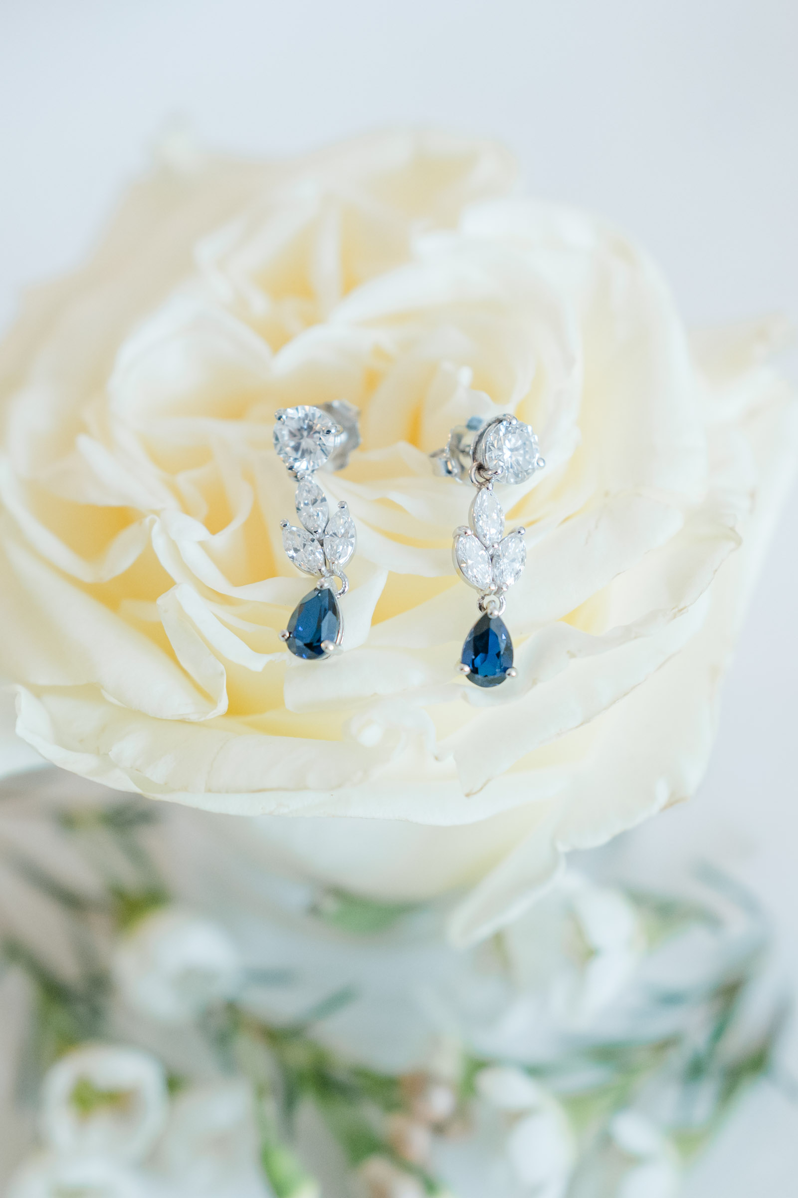 Woodstock Inn Winter Wedding - earrings on flower