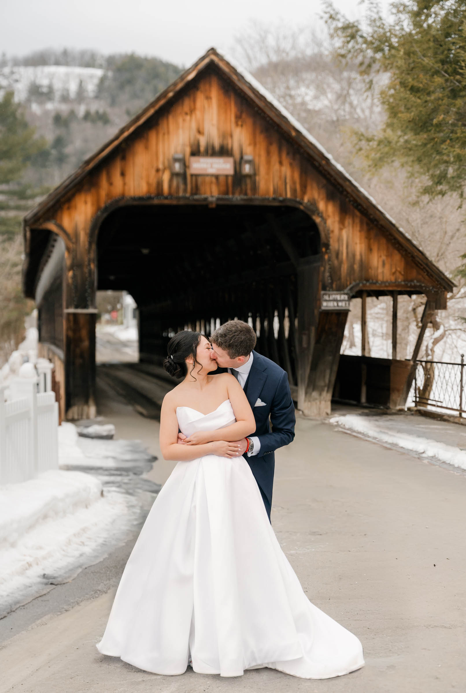 Woodstock Inn Winter Wedding - portrait in front of covered bridge